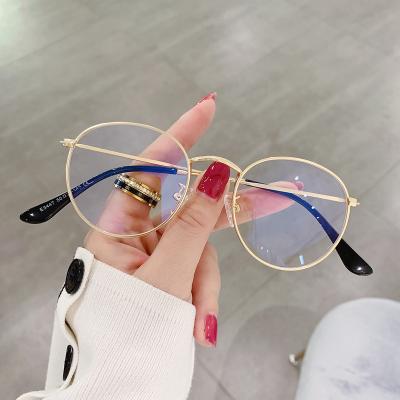 China Anti Blue Light Blocking Anti Blue Light Flat Glass Women Men Metal Frame Myopia Mirror Glasses Frame Ejector Oval Anti Blue Light Glasses for sale