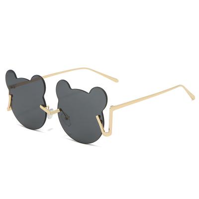 China Fashion Sunglasses Cartoon Glass Personality Bear Sunglasses Kids Candy Color Frameless Sunglasses for sale