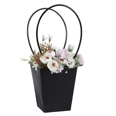 China Wholesale Recycled Materials Beautiful Flower Basket Kraft Paper Flower Bag Waterproof For Florist for sale