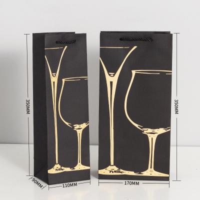 China Recyclable Black Card Stand Up Wine Bag Champagne Gold Paper Bag With Rope for sale