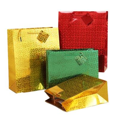 China Recycled Materials Factory Customized Beautiful Shiny Laser Paper Bag Packaging Gift for sale