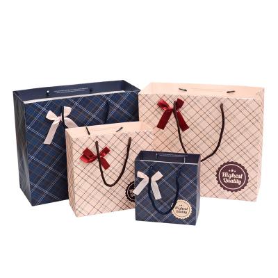 China New Creative Biodegradable Shanger Plaid Paper Bag Business Gift Bags Tote Bags Wholesale for sale