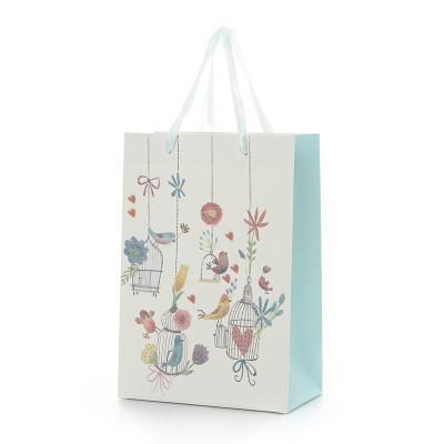 China Small Biodegradable Gift Bags Birthday Gift Paper Shopping Bags For Retail Party Supplies for sale