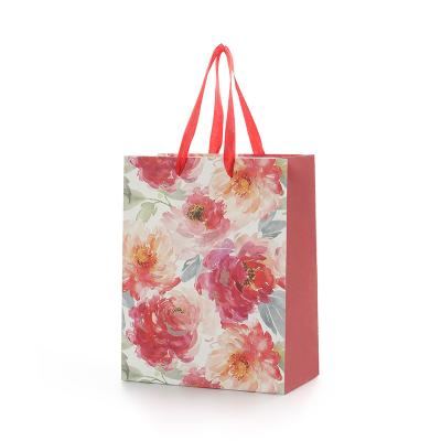 China Biodegradable Paper Gift Bags Floral Paper Gift Bags For Wedding Birthday Gifts Shopping for sale