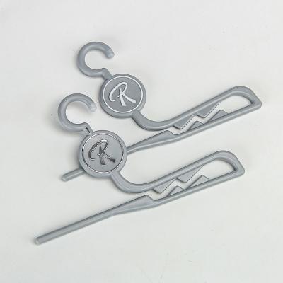 China Custom Logo Custom Colour Plastic Sock Hangers Hooks for sale