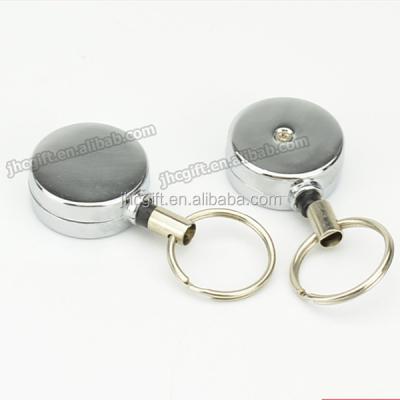 China Promotional Custom Small Zinc Alloy Metal Badge Reel For Key Holder for sale