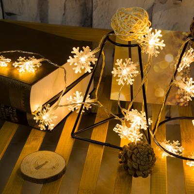 China Outdoor Decoration Insed Snowflake Shaped Small Flashing String Wedding Colorful Decoration Christmas Tree Pendant Lamp String Lamp for sale