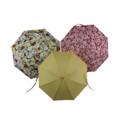 China Cute OEM Mini Umbrella With Custom Logo Fun Small Folding Umbrella for sale