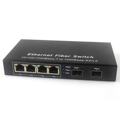 China 4 Ethernet 2 Fiber Ports Unmanaged Ethernet Fiber Switch 10/100/1000M for sale