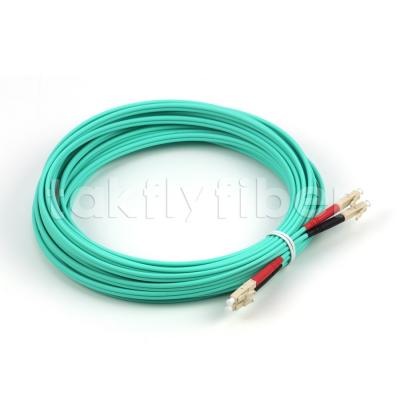 China UPC SM Fiber Optic Patchcord LSZH Aqua Jacket LC To LC OM3 3.0mm for sale