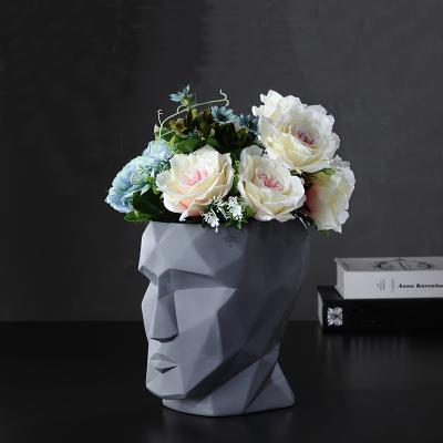 China Modern Art Decor Nordic Origami Design Head Flower Vase Home Ornaments Resin Vase Statue Vase Decor for sale