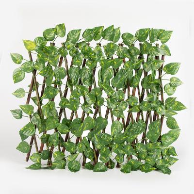 China Hot Sales Minimalist Decorative Artificial Wall Hanging Plants Handmade Green Plastic Artificial Fence for sale