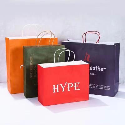 China Luxury Handmade Logo Print Red Brown Paper Bags Logo Print Paper Shopping Bag for sale