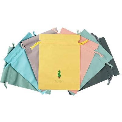 China Small Muilt Colors Wholesale Practical Durable Cotton Drawstring Nylon High Quality Dustproof Shockproof Waterproof Bag Bag Waterproof Bag For Kids for sale