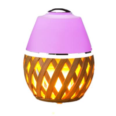 China Household Warm Color Home Flame Light Wood Grain Aroma Diffuser Portable Electric Aroma Diffuser With Lamp for sale