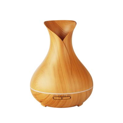 China Speaker Box Home Appliances Electric Wood Grain Oil Diffuser 500ml Essential Ultrasonic Humidifier Aroma Diffuser With Music Speaker for sale