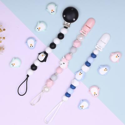 China Kean Hot Sale Eco-Friendly Baby Teething With Funny Teether Baby Toys Silicone Pacifier Clip for sale