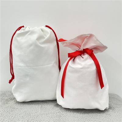 China 100% Polyester Canvas Sublimation Christmas Drawstring Pockets Wholesale Retail Blank Empty Nutcracker For Present Xmas Package Storage for sale