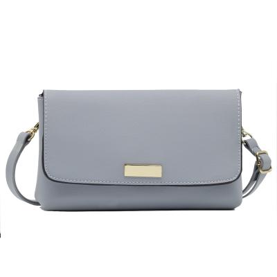 China 100% Eco-Friendly Powder Blue PU Leather Cross - Body Bag Small Purse Clutch Bag Strap for sale