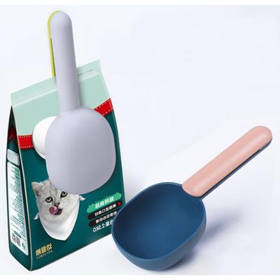 China New Dog Cat Folded Food Scoop Spoon Non-automatic Pet Measuring Spoon Dog Food Spoon for sale