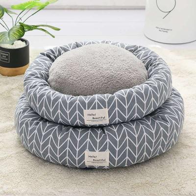 China Hot Selling Sustainable Amazon Comfort Dog Beds Around Pet Sleeping Bed For Dog Cat for sale