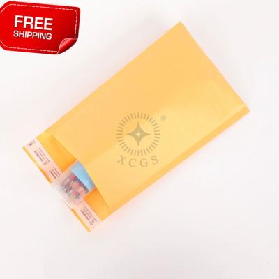 China US Impact Resistance Kraft Paper Stock Shipping Mailer With Bubble Lining Kraft Post for sale