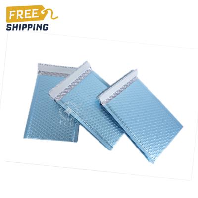 China Custom Print Shock Resistance XCGS Logo Metallic Bubble Mailers Aluminum Foil Wraps Padded Bubble Mailer for sale