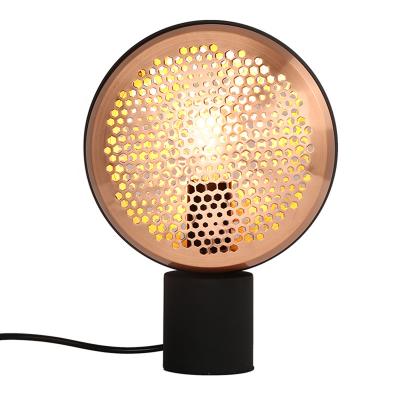 China Fashion design modern post-modern bedroom bedside lamp led iron honeycomb table lamp night light for sale