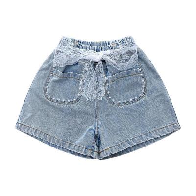 China Factory wholesale breathable fashion lace bow bead decorate girl's kids jeans short light blue cropped jeans for girl for sale