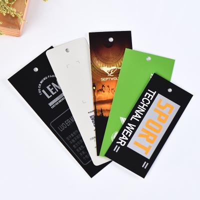 China Recyled New Arrival Clothing Tag Design Cardboard Hang Tag Clothing Taggs Labels Die Cut Paper Clothing Tag Hang Tag With Custom Logo for sale