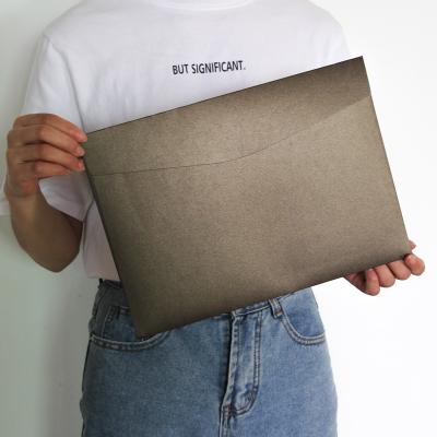 China Disposable Eco-Friendly Stocked Biodegradable T-shirt Packing C4 C5 C6 Size Big Pearl Wallet Custom Printing Glossy Paper Envelope With Custom Logo for sale