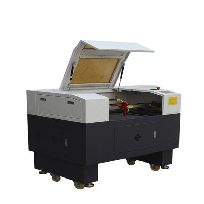 China Laser CUT Best Quality CO2 mini laser cutting machine with down table for acrylic/plywood/wooden label for sale