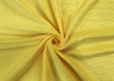 China 210GSM Soft 100% Polyester Embossed Pattern Micro Velvet Fabric - Yellow for sale