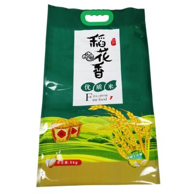 China The fine quality printing rice packing bag 25kg 50kg rice handbag moisture proof packaging for sale