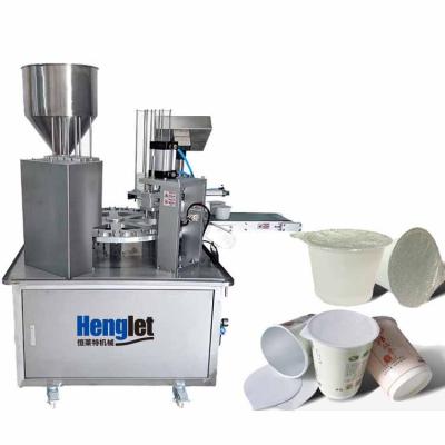 China 2022 New Design Food Filling And Sealing Production Line Rotary Type For Yogurt Jelly Coffee Cup Sealing Machine for sale