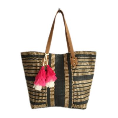 China 2021 Fashion Paper Cloth Material Beach Bag With Tassel Decoration for sale