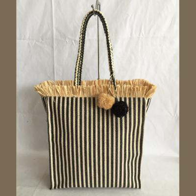 China Shoulder toet bag summer stripe fabric beach bag with pom poms and tassel decoration for sale