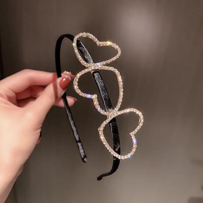 China 2021 Korean Minimalist Luxury Crystals Hairband Korean Minimalist Style Heart Fashion Hollow Hair Accessories For Young Girls for sale