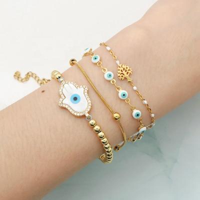 China Environmental Friendly Charm White 4 Pcs Set Adjustable Custom Gold Plated Enamel Stainless Steel Turkish Evil Eyes Bracelet Jewelry for sale