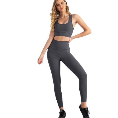 China Breathable Seamless 2 Pieces Yoga Outfits Exercise Wear For Women Yoga Sports Bra And Leggings Set for sale