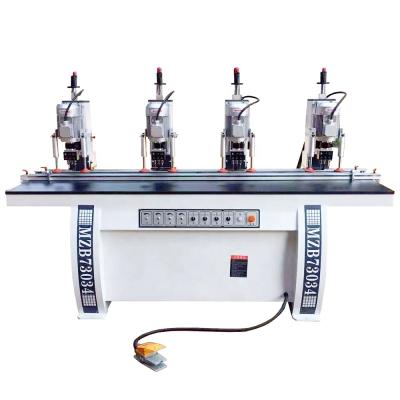 China Drilling Wood Panel Holes Four Heads Hinge Drilling Machine Woodworking Hinge Drilling Machine for sale