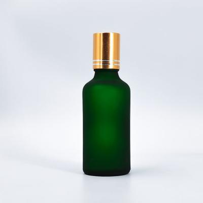 China Personal Care Container 50ml Inexpensive Cosmetic Container Vegetable Oil Skin Care Essence Green Frosted Glass Oil Bottle for sale