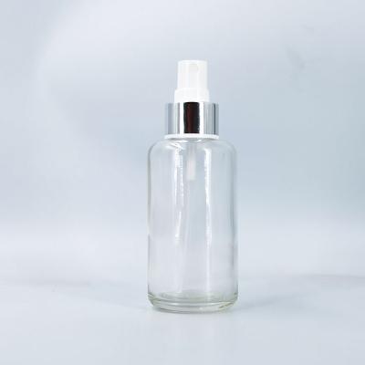 China Personal Care 100ml Empty Clear Glass Round Cosmetic Spray Pump Bottle Manufacturer For Sale for sale