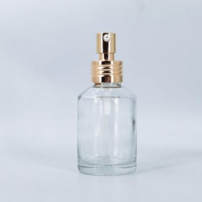 China Wholesale Supply Oblique Shoulder Personal Care 60ML Factory Pressure Pump Clear Emulsion Glass Bottle for sale