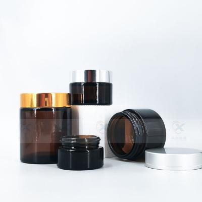 China Personal Care 20g 30g 50g 100g Amber Cream Bottle Glass Cosmetic Eye Cream Jar for sale