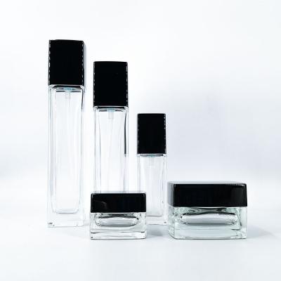 China 50ml 100ml 120ml Square Clear Personal Care Cosmetics Set Bottle 10g 30g Face Cream Lotion Glass Bottle for sale