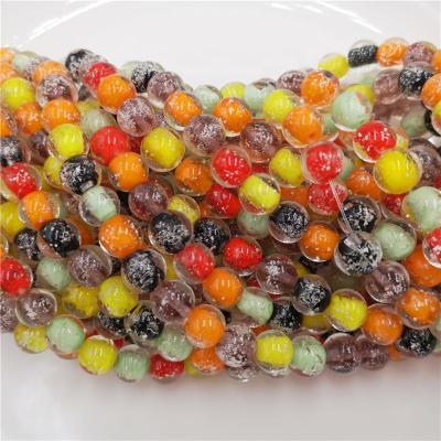 China Luminous Round 8mm Glow In The Dark Lampwork Loose Beads Luminous Millefiori Glass Beads for sale