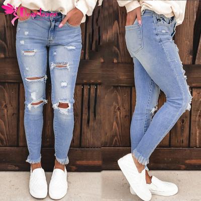 China 2021 new fashion women casual light blue washed ripped jeans wholesale QUICK DRY for sale