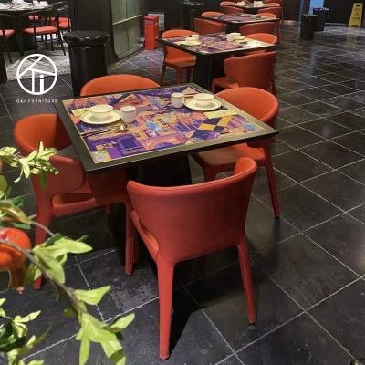 China Modern hot hotel chair luxury fabric designs dining room and cafe restaurant chairs and desk with metal legs table and chair set for sale