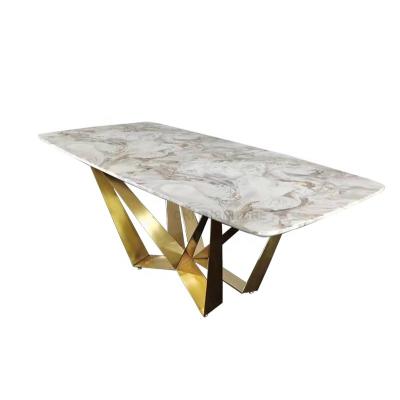 中国 (Other)dining room gold stainless steel adjustable unique fancy modern luxury metal crossed leg stone dining table 8 seater marble 販売のため